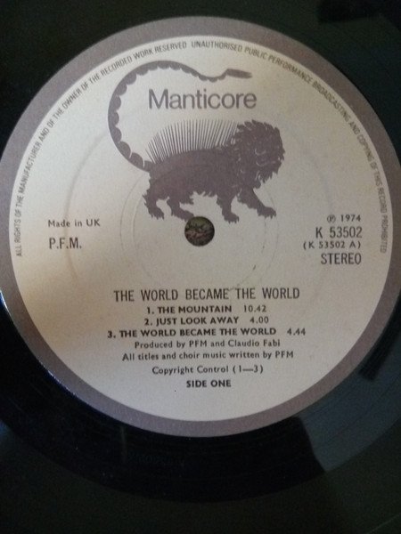 Premiata Forneria Marconi - The World Became The World (LP, Album, Die) - Image 2